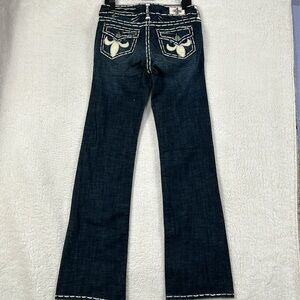 Laguna Beach vintage dark wash bold boot, cut jeans size 31